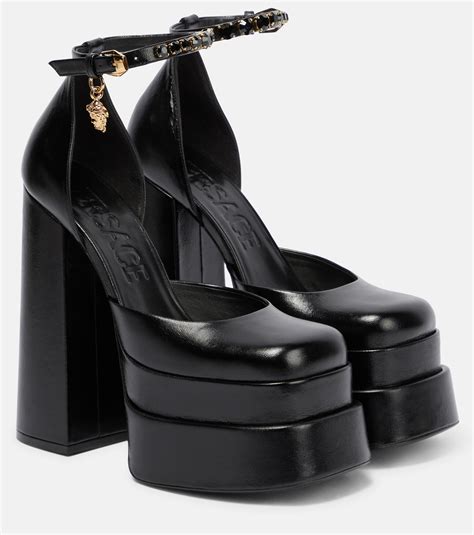 versace medusa charm leather platform sneakers|Versace aevitas pumps.